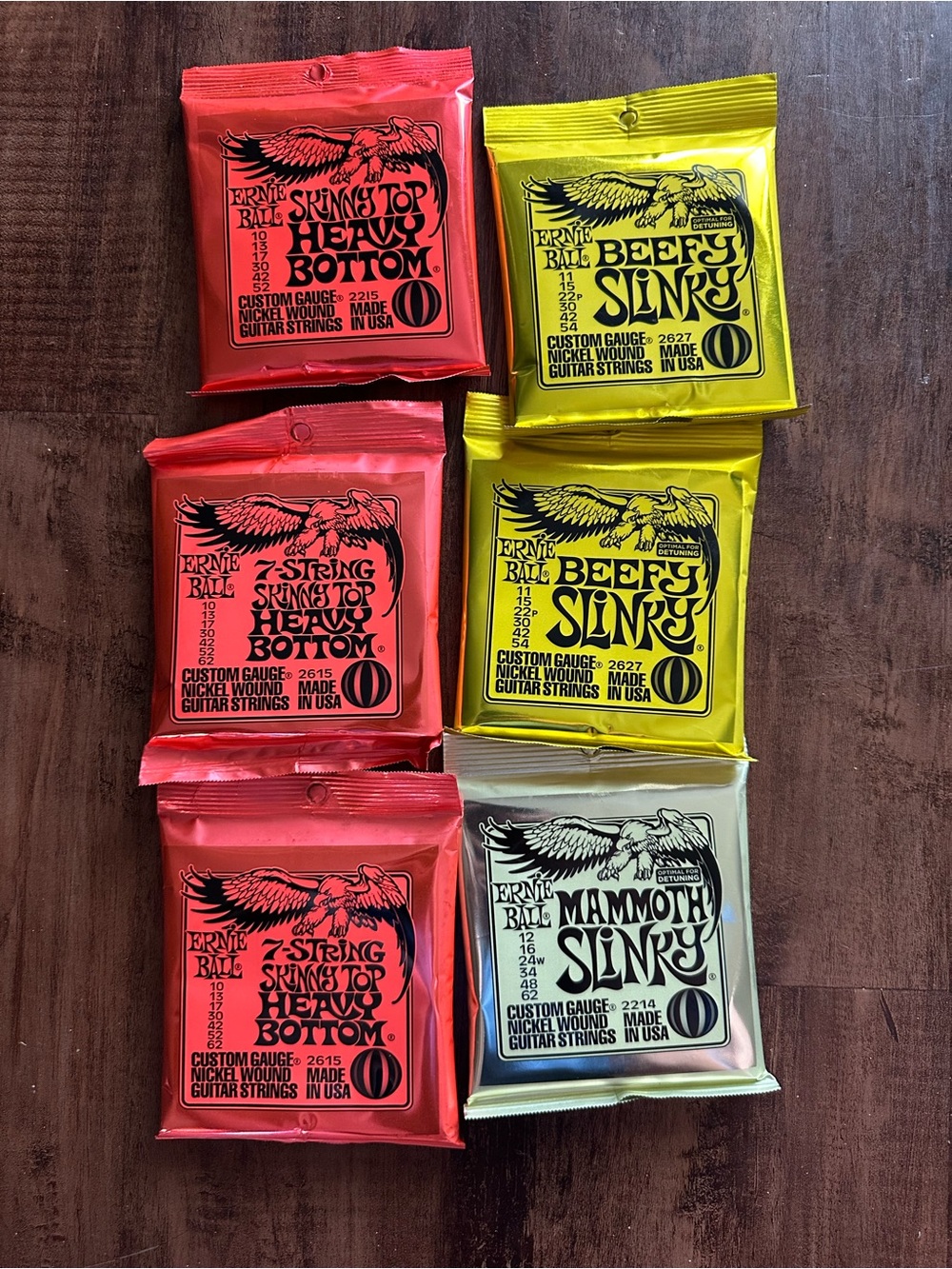 Ernie Ball Slinky & Heavy Bottom Guitar String Packs - Red, Yellow, Silver Lot